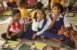 Children eating in India