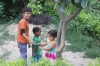 Apra and the boys playing in the garden